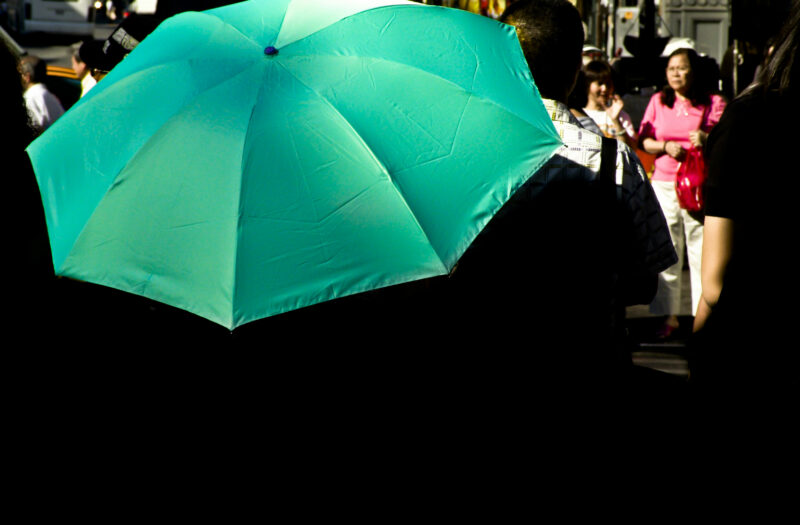 Woman With Green Umbrella Free Stock Photo
