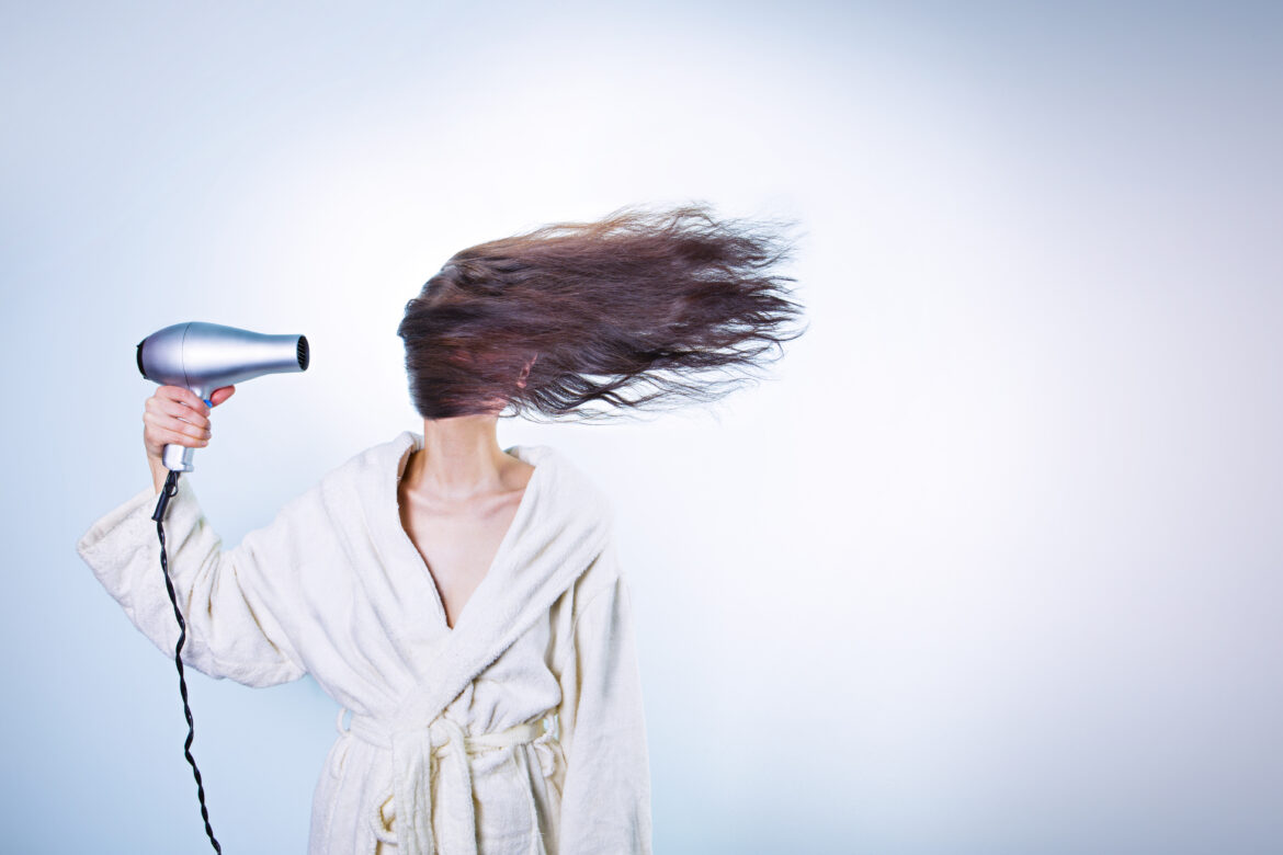 Woman Drying Hair Free Stock Photo