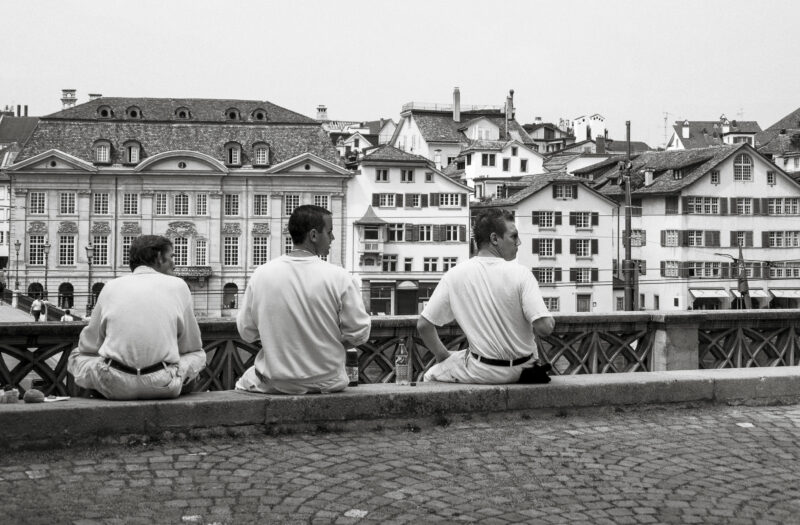 Boys Sitting on a Wall Free Stock Photo