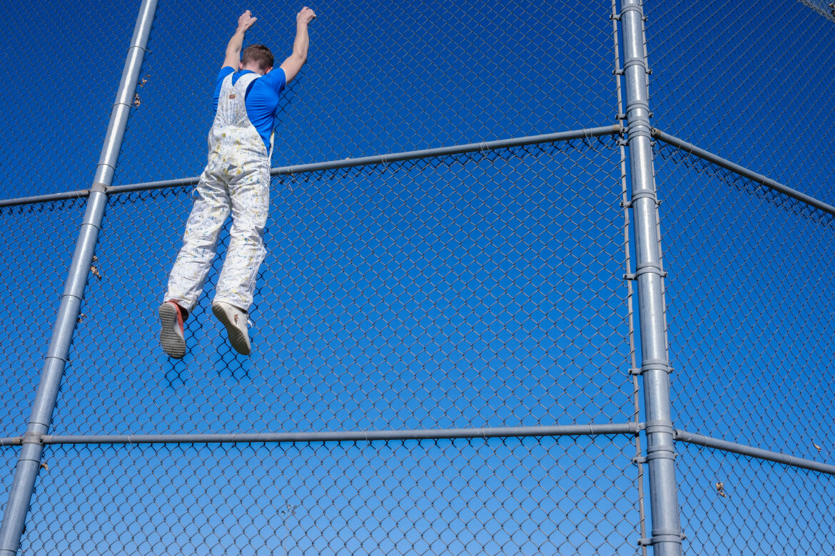 Fence Climbing Free Stock Photo